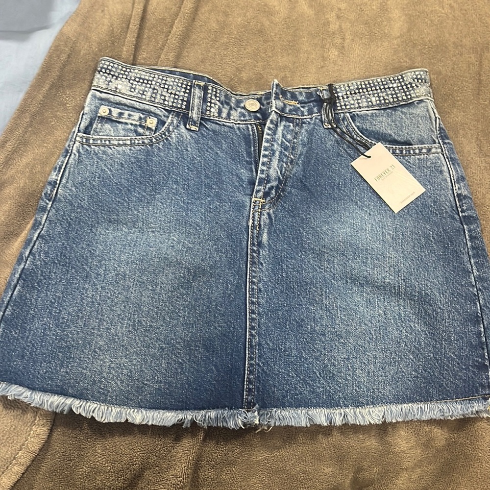 Denim forever 21 mini skirt never worn with dainty diamond gems on waist line